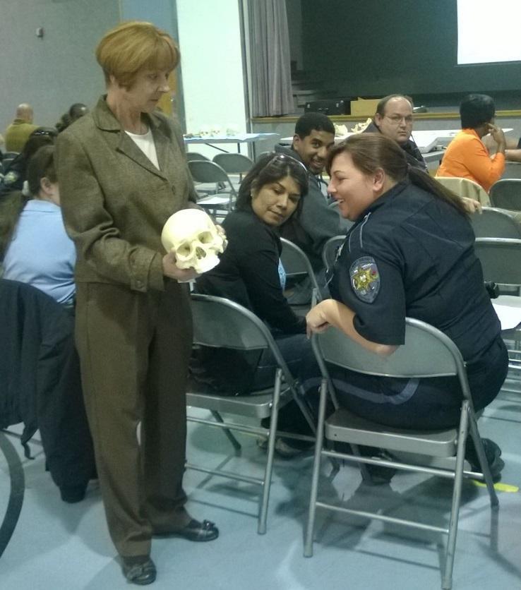 Officers being presented with a skull