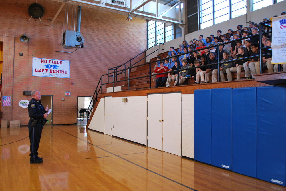 St. Mary Parish Sheriff's Deputy Walter Shepherd speaking to DARE students