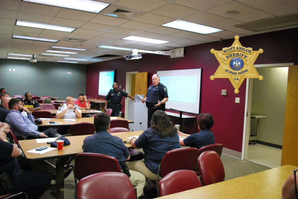 SRO speaking to seated officers