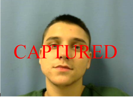 T. Scarbrough mugshot with CAPTURED in red letters over the image