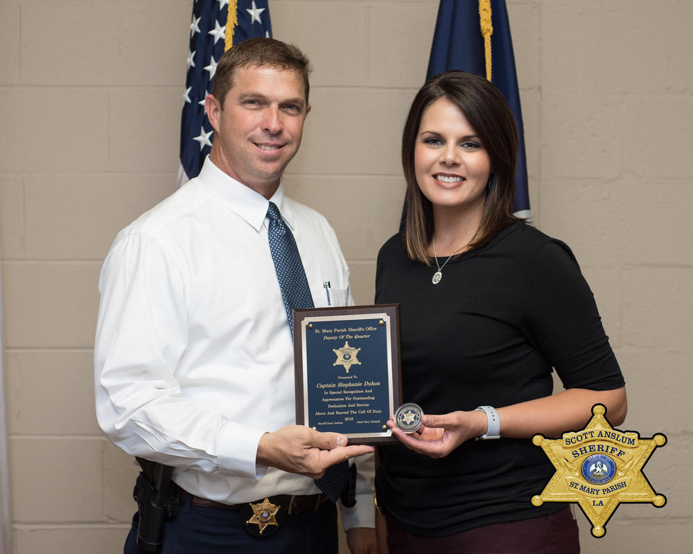 Capt. Stephanie Duhon accepting an award.