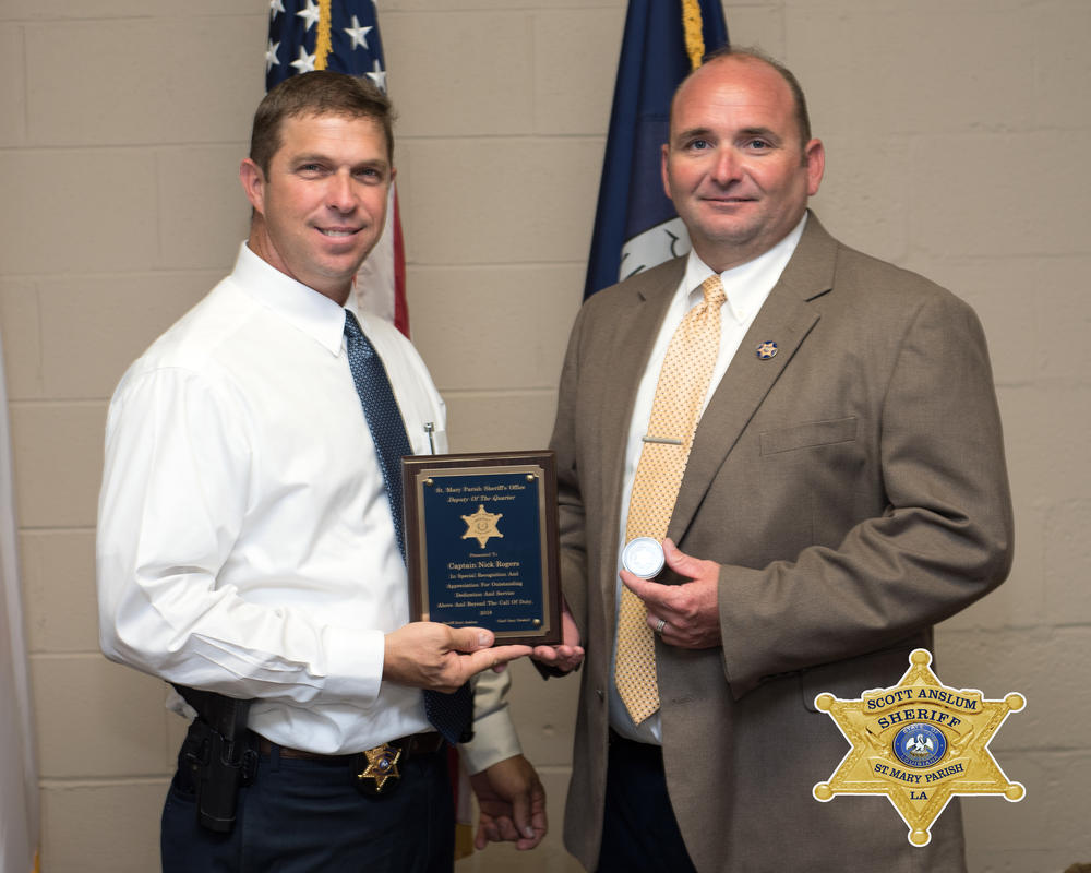 The Sheriff presenting the award to Captain Nick Rogers