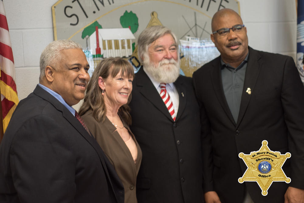 Sheriff Blaise Smith with three other people