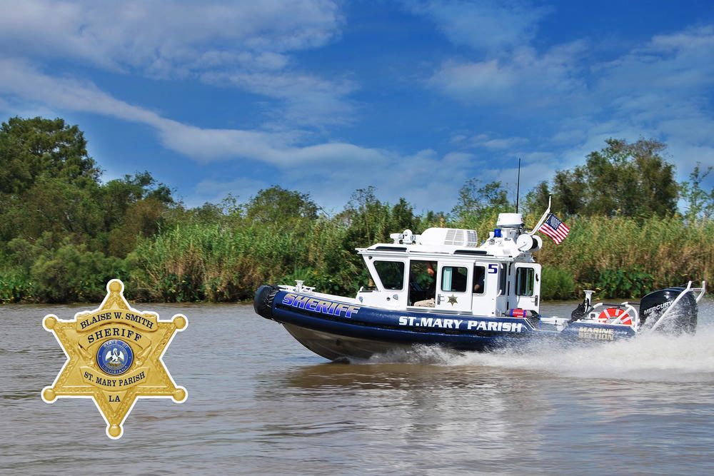 Sheriff's motorboat moving across the water at speed