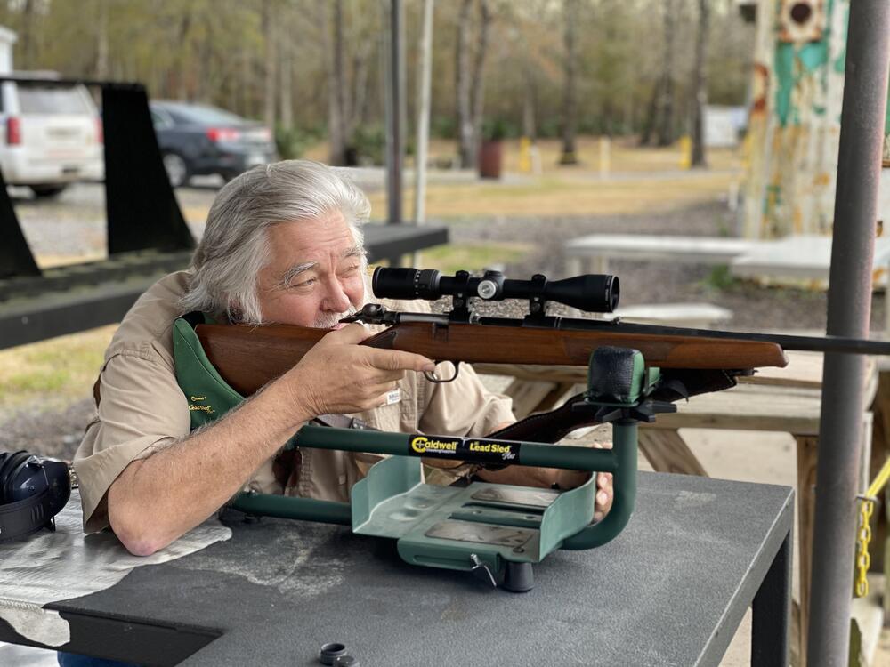 Sheriff Blaise Smith shooting from one of the shooter's tables on the rifle range