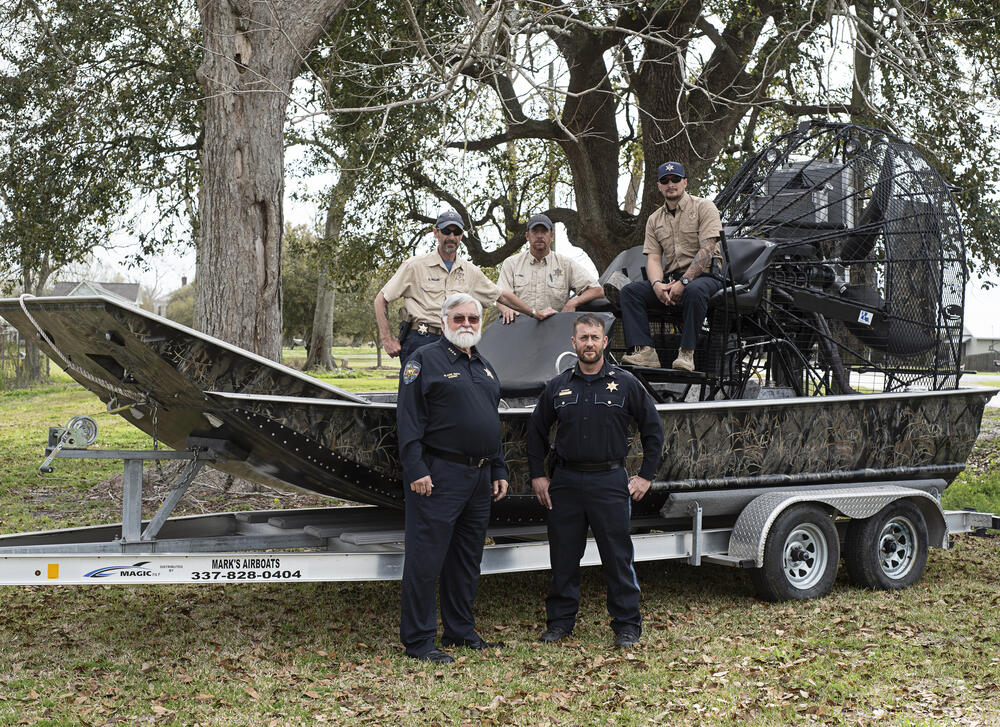 marine section group posing with airboat