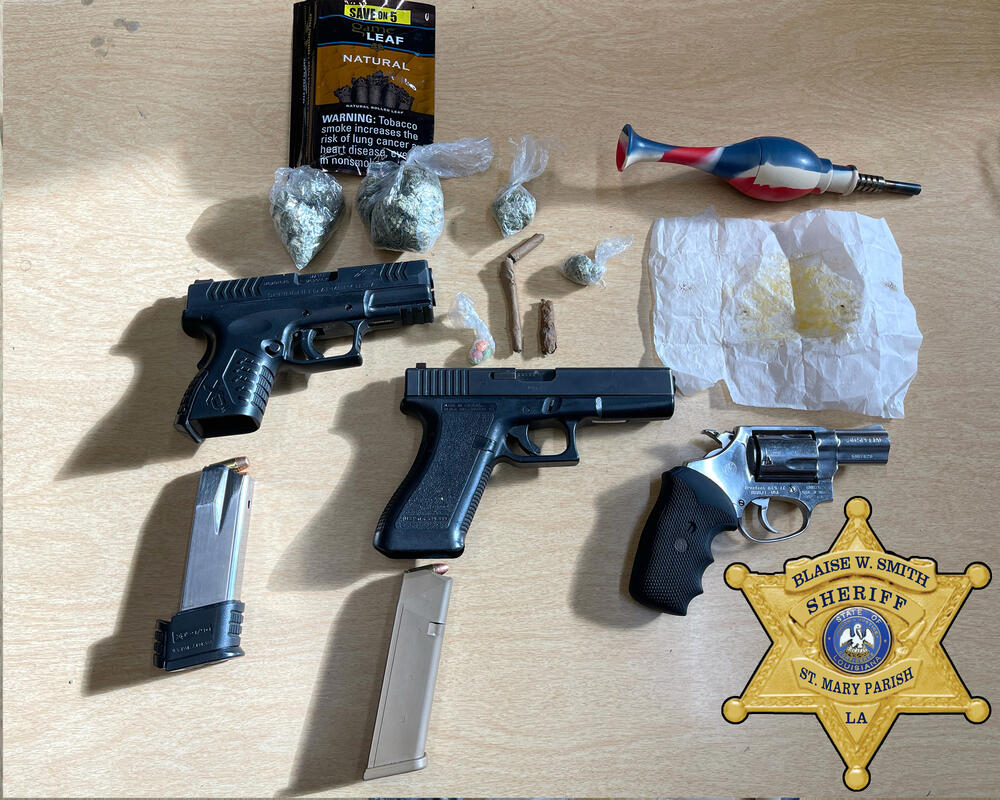Guns, drugs, and drug paraphernalia confiscated