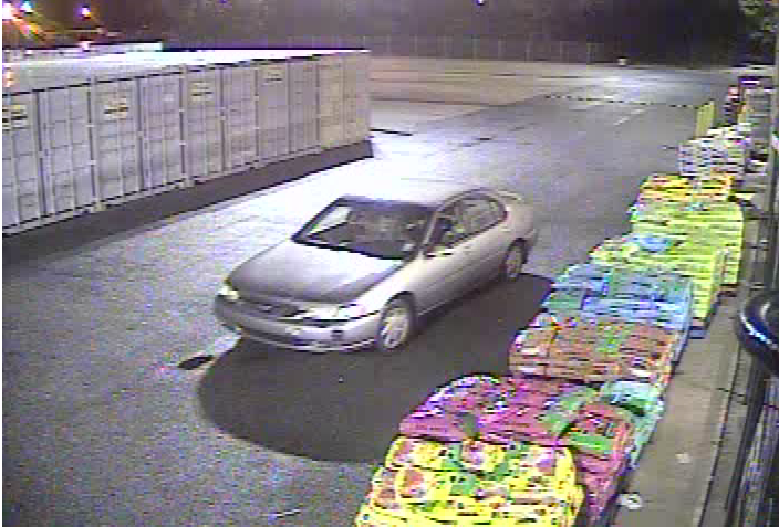 tan 4-door sedan - Suspect Vehicle