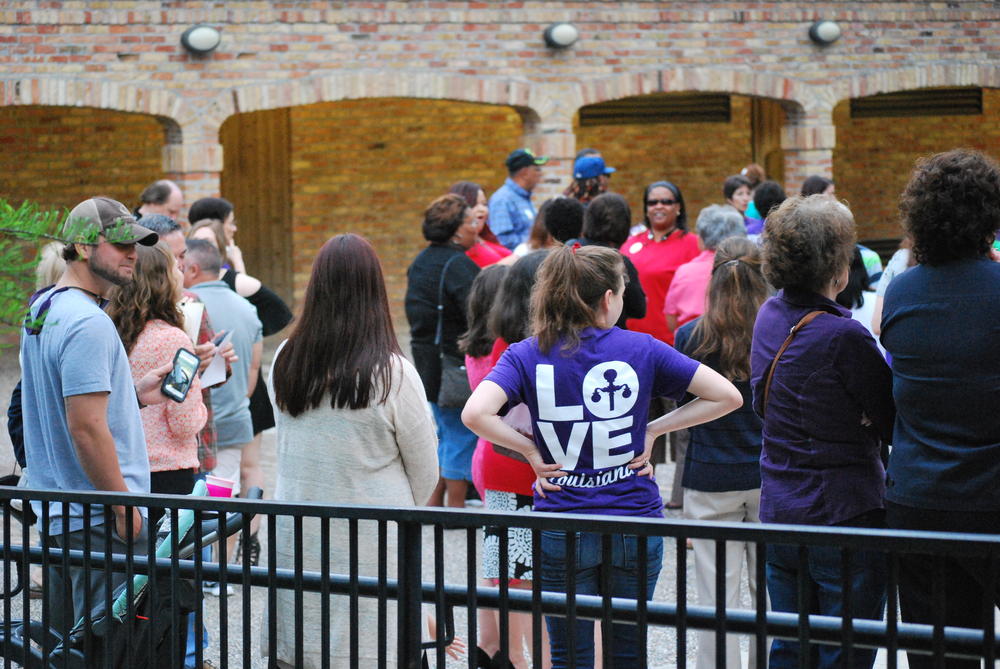 Crowd of people standing outside